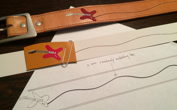 Benta belt sketch and belt on table (wide)